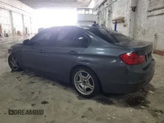 2015 BMW 3 Series 320i xDrive with VIN WBA3C3C52FK200479, listed as a Copart auction lot 52575125 with 153,930 mi miles and Salvage title. Bid and sale history available at DreamBid. Image 2.