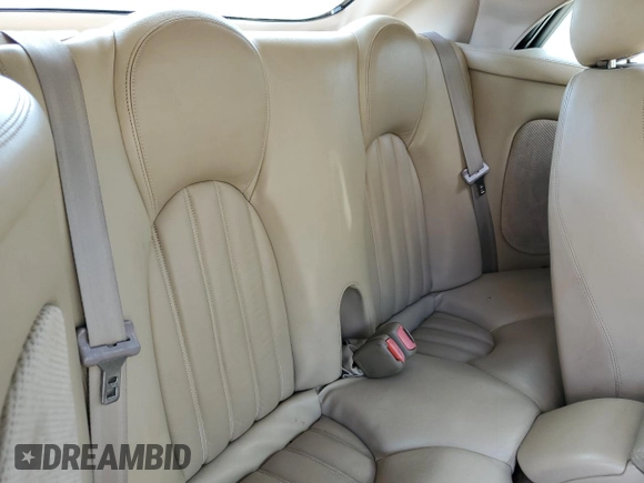 2002 Jaguar XK with VIN SAJDA42C22NA23724, listed as a Copart auction lot 53521005 with 61,468 mi miles and Salvage Title. Bid and sale history available at DreamBid. Image 10.