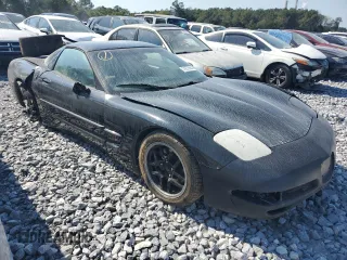 2000 Chevrolet Corvette with VIN 1G1YY22G6Y5116991, listed as a Copart auction lot 74272984 with 136,994 mi miles and Salvage Title. Bid and sale history available at carsss.com. Image 4.