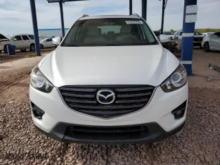 2016 Mazda CX-5 Grand Touring with VIN JM3KE2DY7G0673794, listed as a Copart auction lot 51016755 with 75,691 mi miles and Salvage Title. Bid and sale history available at carsss.com. Image 5.