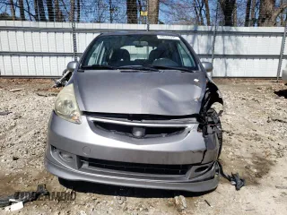 2007 Honda Fit Sport with VIN JHMGD38677S063204, listed as a Copart auction lot 48680995 with 233,496 mi miles and Salvage Title. Bid and sale history available at carsss.com. Image 5.