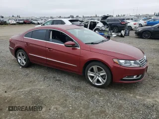 2014 Volkswagen CC R-Line with VIN WVWBP7AN5EE526531, listed as a Copart auction lot 86204964 with 96,521 mi miles and Salvage Title. Bid and sale history available at carsss.com. Image 4.