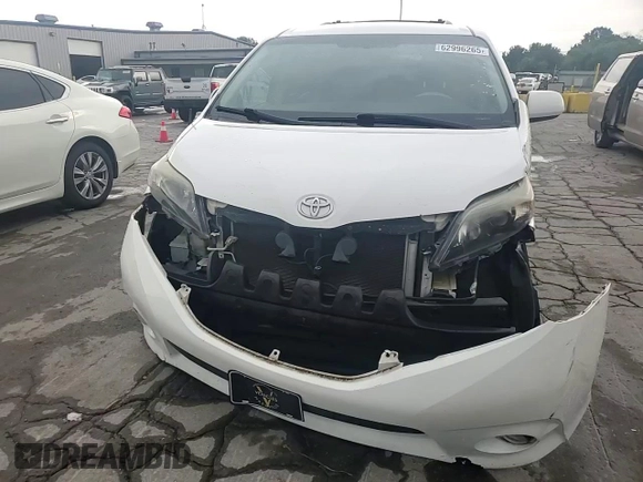 2013 Toyota Sienna SE with VIN 5TDXK3DC5DS332680, listed as a Copart auction lot 62996265 with 185,332 mi miles and Clean title. Bid and sale history available at DreamBid. Image 14.