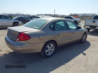 2002 Ford Taurus SES Standard with VIN 1FAFP55U52A156214, listed as a IAAI auction lot 41803668 with 31,693 mi miles. Bid and sale history available at carsss.com. Image 4.