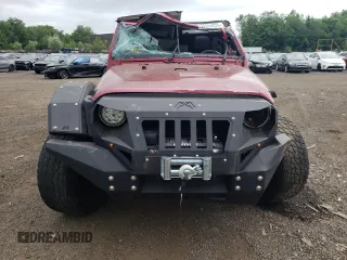 2012 Jeep Wrangler Unlimited Sport with VIN 1C4BJWDG6CL234419, listed as a Copart auction lot 62284825 with 66,649 mi miles and Salvage title. Bid and sale history available at DreamBid. Image 5.