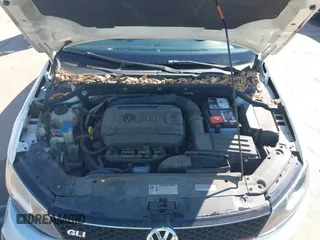 2014 Volkswagen Jetta GLI Edition 30 z VIN 3VW4S7AJ3EM278162, wystawiony jako IAAI lot #41649711 z przebiegiem 136 402 mil mil oraz . Historia ofert i sprzedaży dostępna na DreamBid. Obrazek 10.