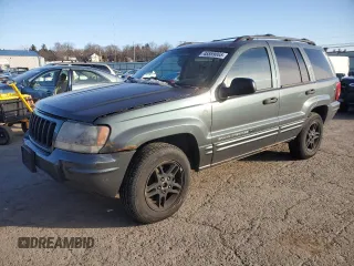 2004 Jeep Grand Cherokee with VIN 1J8GW48N24C304268, listed as a Copart auction lot 45559065 with 252,903 mi miles and Salvage title. Bid and sale history available at DreamBid. Image 1.