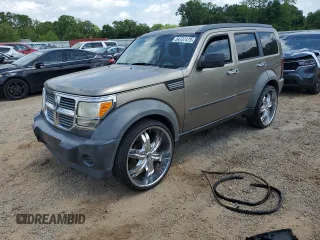 2007 Dodge Nitro SXT с VIN 1D8GT28K47W606529, выставлен на аукционе Copart как лот 54737475 с пробегом 176 695 миль миль и Списание • Salvage title. История ставок и продаж доступна на DreamBid. Изображение 1.