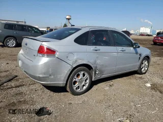 2008 Ford Focus SE with VIN 1FAHP35NX8W179702, listed as a Copart auction lot 43032555 with 101,309 mi miles and Salvage Title. Bid and sale history available at carsss.com. Image 3.