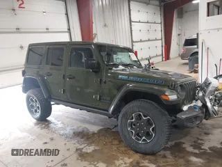 2023 Jeep Wrangler Rubicon z VIN 1C4JJXR68PW584575, wystawiony jako IAAI lot #41391275 z przebiegiem 38 122 mil mil oraz . Historia ofert i sprzedaży dostępna na DreamBid. Obrazek 1.