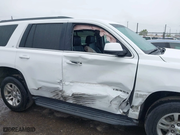 2017 Chevrolet Tahoe LT with VIN 1GNSCBKC1HR200807, listed as a IAAI auction lot 41917005 with 129,910 mi miles. Bid and sale history available at carsss.com. Image 6.