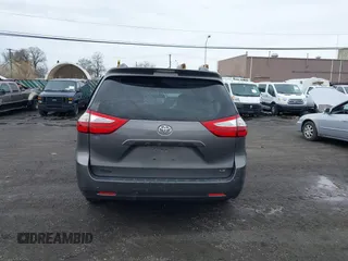 2015 Toyota Sienna LE AAS with VIN 5TDKK3DC1FS615090, listed as a IAAI auction lot 41965112 with 116,745 mi miles. Bid and sale history available at carsss.com. Image 16.