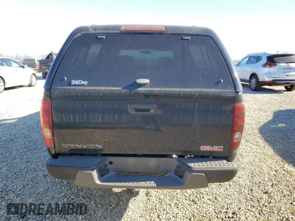 2006 GMC Canyon SLE Z71 with VIN 1GTDS196X68258884, listed as a Copart auction lot 89098225 with 130,982 mi miles and Salvage Title. Bid and sale history available at carsss.com. Image 6.