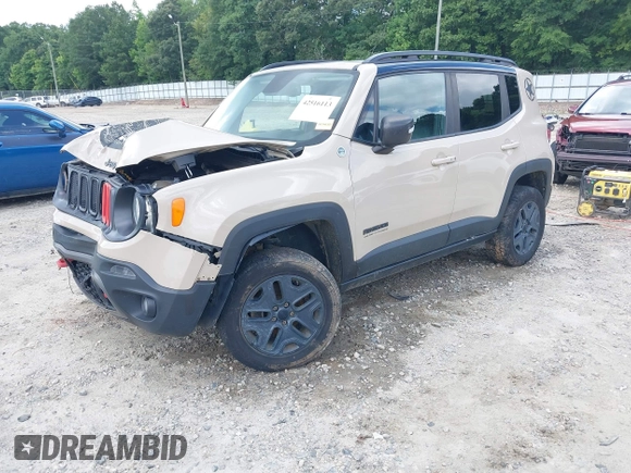 2017 Jeep Renegade Trailhawk with VIN ZACCJBCB5HPF70617, listed as a IAAI auction lot 42516113 with 66,187 mi miles and . Bid and sale history available at DreamBid. Image 2.