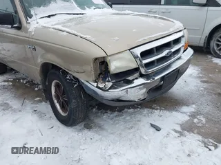 1999 Ford Ranger XL with VIN 1FTYR10V4XUB79205, listed as a IAAI auction lot 41311729 with 160,635 mi miles. Bid and sale history available at carsss.com. Image 6.