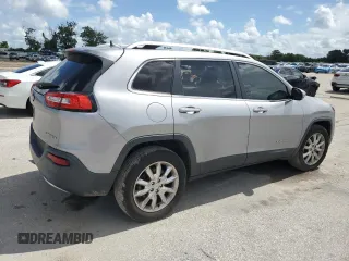 2016 Jeep Cherokee Limited with VIN 1C4PJMDB5GW244734, listed as a Copart auction lot 64608765 with 166,953 mi miles and Salvage title. Bid and sale history available at DreamBid. Image 3.