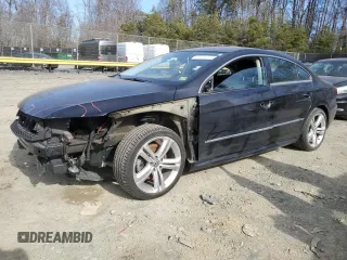 2015 Volkswagen CC Sport with VIN WVWBN7AN4FE814712, listed as a Copart auction lot 48027705 with 102,477 mi miles and Salvage Title. Bid and sale history available at DreamBid. Image 1.