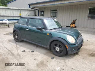 2007 MINI Hardtop with VIN WMWMF33537TL77985, listed as a Copart auction lot 61908635 with 180,470 mi miles and Salvage title. Bid and sale history available at DreamBid. Image 4.