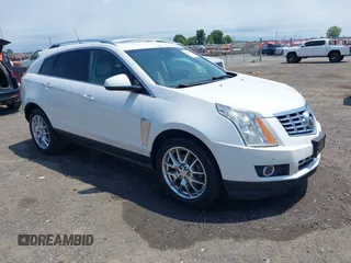 2013 Cadillac SRX Performance Collection z VIN 3GYFNDE35DS578495, wystawiony jako IAAI lot #42323061 z przebiegiem 160 473 mil mil oraz . Historia ofert i sprzedaży dostępna na DreamBid. Obrazek 1.
