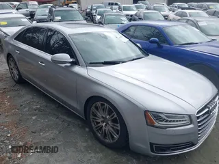 2015 Audi A8 L 4.0T with VIN WAU32AFD7FN021203, listed as a IAAI auction lot 41736045 with 135,471 mi miles. Bid and sale history available at carsss.com. Image 13.
