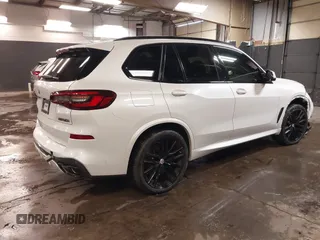 2022 BMW X5 M50i with VIN 5UXJU4C01N9M81857, listed as a IAAI auction lot 41592857 with 15,122 mi miles. Bid and sale history available at carsss.com. Image 4.