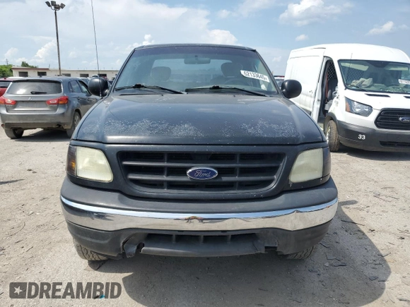 2003 Ford F-150 XL with VIN 2FTPX18L13CA34024, listed as a Copart auction lot 62133645 with 224,922 mi miles and Salvage title. Bid and sale history available at DreamBid. Image 5.
