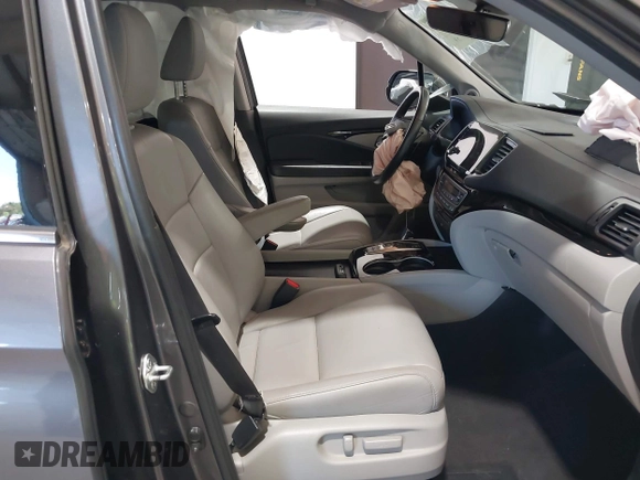 2021 Honda Pilot Touring 8-Passenger with VIN 5FNYF6H95MB048527, listed as a IAAI auction lot 42542138 with 40,584 mi miles and . Bid and sale history available at DreamBid. Image 5.