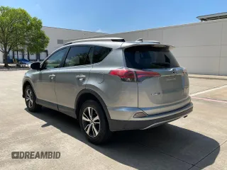 2018 Toyota RAV4 XLE with VIN 2T3WFREV8JW496356, listed as a Copart auction lot 51367765 with 71,049 mi miles and Clean Title. Bid and sale history available at DreamBid. Image 3.