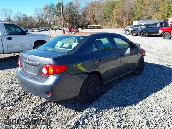 2010 Toyota Corolla with VIN 2T1BU4EE3AC316203, listed as a IAAI auction lot 35972106 with 198,544 mi miles. Bid and sale history available at carsss.com. Image 4.