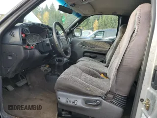 1999 Dodge Ram 2500 with VIN 1B7KF2362XJ504072, listed as a Copart auction lot 77649814 with 0 mi miles and Salvage Title. Bid and sale history available at carsss.com. Image 7.