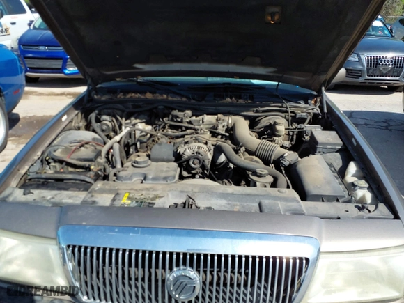 2003 Mercury Grand Marquis GS Convenience with VIN 2MEFM74W43X662724, listed as a IAAI auction lot 42036847 with 234,008 mi miles. Bid and sale history available at carsss.com. Image 10.