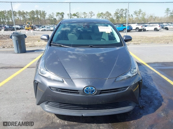 2021 Toyota Prius L Eco with VIN JTDKAMFU4M3134778, listed as a IAAI auction lot 41843429 with 145,757 mi miles. Bid and sale history available at carsss.com. Image 12.