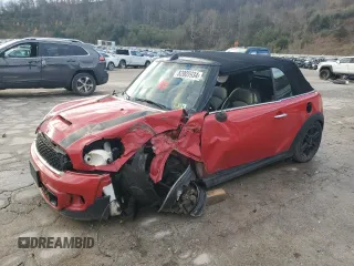 2013 MINI Convertible S with VIN WMWZP3C53DT705999, listed as a Copart auction lot 82009934 with 85,047 mi miles and Salvage Title. Bid and sale history available at DreamBid. Image 1.