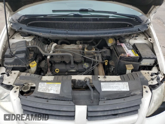 2005 Dodge Caravan SE with VIN 1D4GP24R45B273262, listed as a Copart auction lot 59026005 with 215,054 mi miles and Salvage title. Bid and sale history available at DreamBid. Image 12.