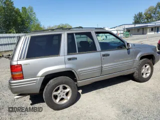1998 Jeep Grand Cherokee Limited z VIN 1J4GZ88Z1WC231772, wystawiony jako Copart lot #55697775 z przebiegiem 178 896 mil mil oraz Czysty tytuł • Clean title. Historia ofert i sprzedaży dostępna na DreamBid. Obrazek 3.