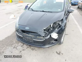 2015 Ford Fiesta SE z VIN 3FADP4EJ3FM115466, wystawiony jako IAAI lot #41849165 z przebiegiem 178 002 mil mil oraz . Historia ofert i sprzedaży dostępna na DreamBid. Obrazek 6.