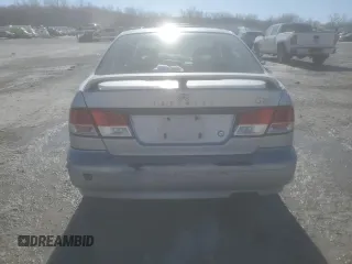 2002 Infiniti G20 Luxury z VIN JNKCP11A62T503344, wystawiony jako Copart lot #41853675 z przebiegiem 174 128 mil mil oraz Czysty tytuł • Clean title. Historia ofert i sprzedaży dostępna na DreamBid. Obrazek 6.