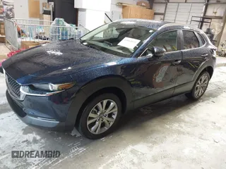 2022 Mazda CX-30 S Select z VIN 3MVDMBBL0NM440747, wystawiony jako IAAI lot #41864038 z przebiegiem 9667 mil mil oraz . Historia ofert i sprzedaży dostępna na DreamBid. Obrazek 17.