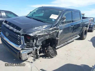 2018 Toyota Tundra SR5 z VIN 5TFDW5F12JX694518, wystawiony jako IAAI lot #41663831 z przebiegiem 183 220 mil mil oraz . Historia ofert i sprzedaży dostępna na DreamBid. Obrazek 18.