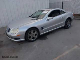 2005 Mercedes-Benz SL-Class 5.0L with VIN WDBSK75F25F100967, listed as a IAAI auction lot 41562622 with 76,498 mi miles. Bid and sale history available at carsss.com. Image 2.