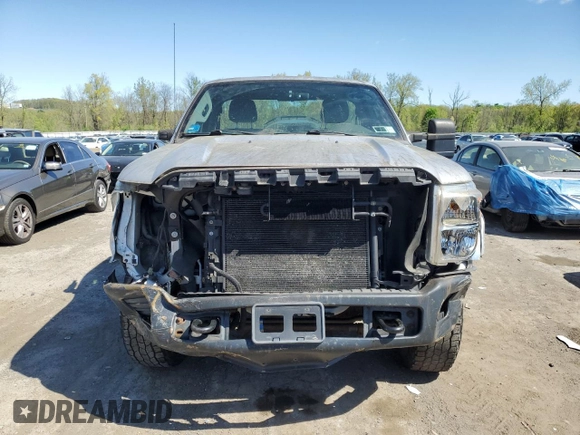 2012 Ford F-250 XL with VIN 1FTBF2B64CEA04600, listed as a Copart auction lot 54930025 with 127,925 mi miles and Salvage title. Bid and sale history available at DreamBid. Image 5.