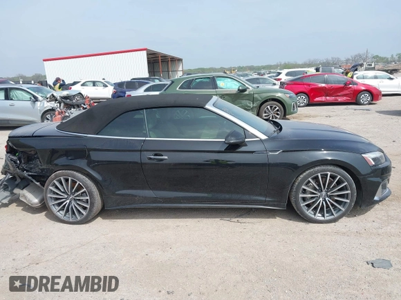 2020 Audi A5 Cabriolet Premium z VIN WAUWNGF50LN000334, wystawiony jako IAAI lot #41919556 z przebiegiem 56 494 mil mil oraz . Historia ofert i sprzedaży dostępna na DreamBid. Obrazek 13.
