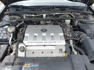 2002 Cadillac Eldorado ESC z VIN 1G6EL12Y82B105241, wystawiony jako IAAI lot #42241609 z przebiegiem 90 442 mil mil oraz . Historia ofert i sprzedaży dostępna na DreamBid. Obrazek 10.
