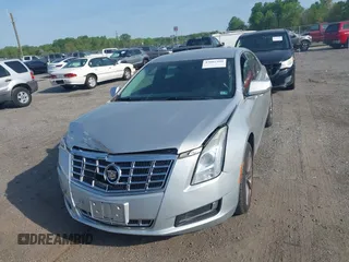 2013 Cadillac XTS with VIN 2G61N5S31D9135710, listed as a IAAI auction lot 42002480 with 162,029 mi miles. Bid and sale history available at carsss.com. Image 12.