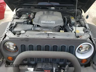 2013 Jeep Wrangler Unlimited Rubicon 10th Anniversary with VIN 1C4HJWFGXDL543660, listed as a Copart auction lot 61462104 with 115,897 mi miles and Salvage title. Bid and sale history available at DreamBid. Image 12.