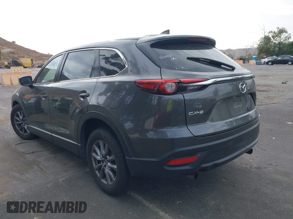 2018 Mazda CX-9 Sport with VIN JM3TCABY1J0224741, listed as a IAAI auction lot 41265876 with 126,686 mi miles and . Bid and sale history available at DreamBid. Image 3.