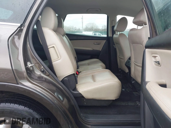 2015 Mazda CX-9 Touring with VIN JM3TB2CA5F0469348, listed as a IAAI auction lot 41516084 with 134,460 mi miles. Bid and sale history available at carsss.com. Image 8.