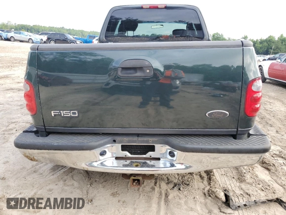 2003 Ford F-150 XL with VIN 1FTRX07WX3KB99581, listed as a Copart auction lot 56907765 with 232,597 mi miles and Salvage title. Bid and sale history available at DreamBid. Image 6.