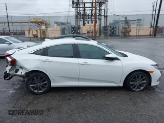 2021 Honda Civic Sedan EX-L with VIN 19XFC1F77ME205128, listed as a IAAI auction lot 41562202 with 82,257 mi miles. Bid and sale history available at carsss.com. Image 13.