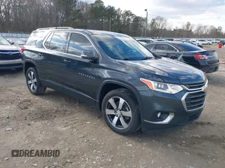 2021 Chevrolet Traverse LT z VIN 1GNERHKW7MJ212137, wystawiony jako IAAI lot #41420829 z przebiegiem 100 371 mil mil oraz . Historia ofert i sprzedaży dostępna na DreamBid. Obrazek 1.